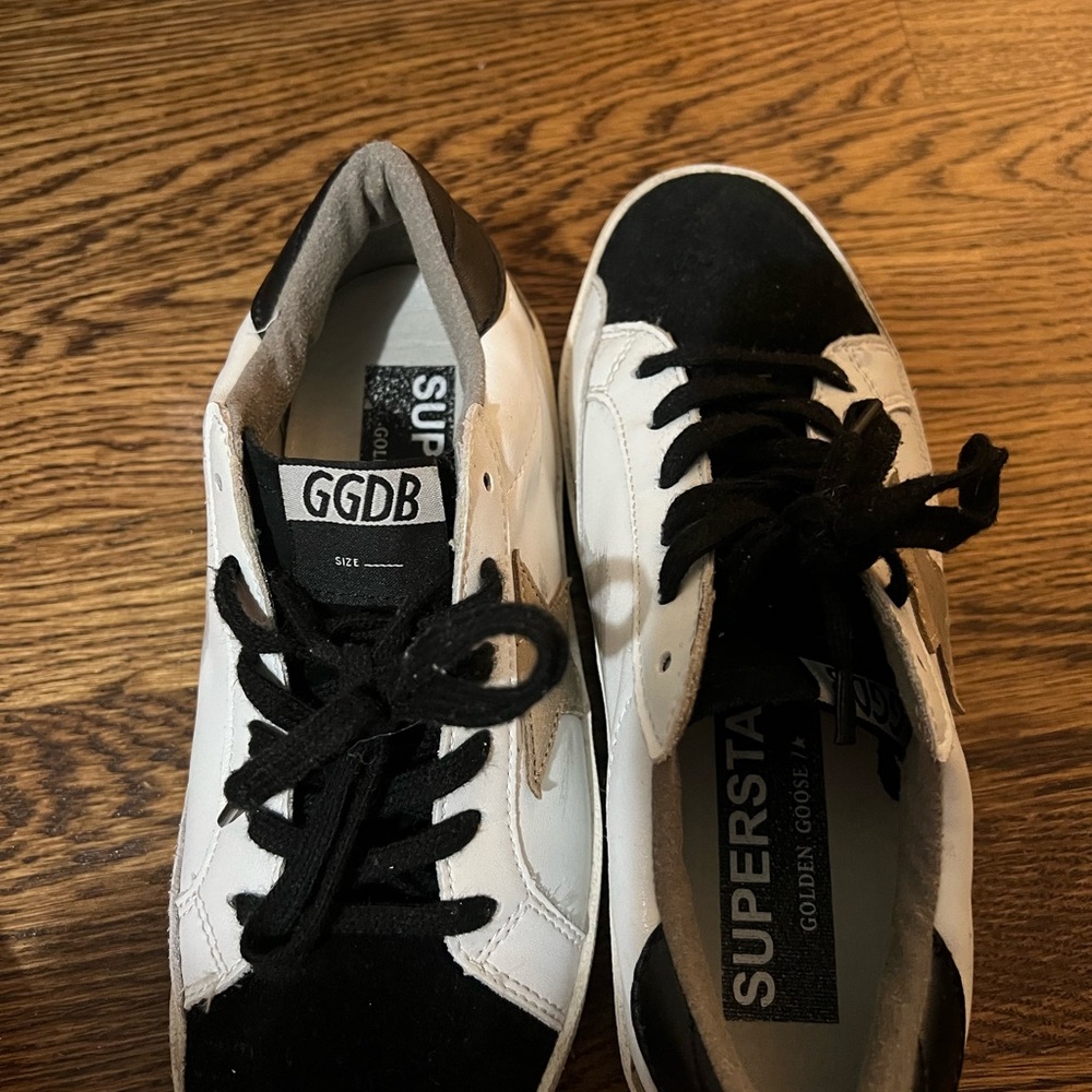 Golden Goose Black and White Superstar Sneakers